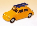VW Beetle cu schiuri
